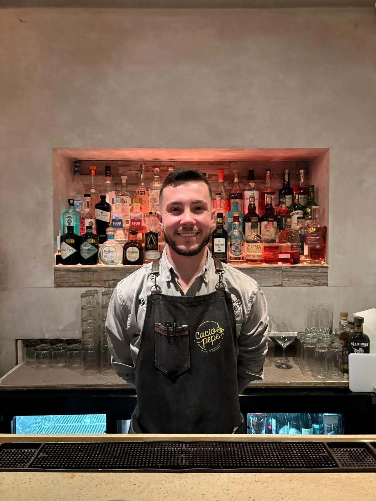 Professional bartender preparing craft cocktails
